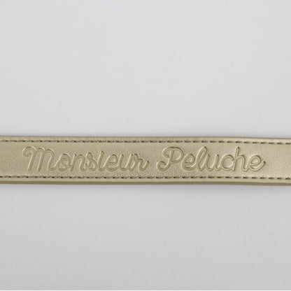 photo produit colliers en cuir or avec le logo estampé Monsieur Peluche 